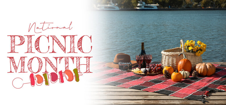 Banner for National Picnic Month with tasty food and wine on plaid near river