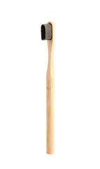 Bamboo tooth brush on white background