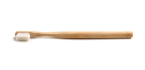 Bamboo tooth brush on white background
