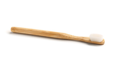 Bamboo tooth brush on white background