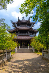Fototapeta premium Bai Dinh Buddhist temple in Ning Binh Vietnam filled with architectural marvels of statues icons and magnificent Buddha buildings with classic ancient design 