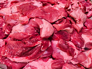 Fresh raw meat, Showcase with raw meat in buther shop. Fresh meat in supermarket. Raw meat background