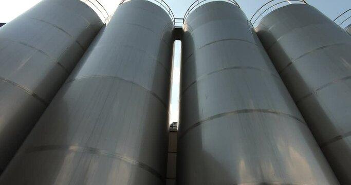 A milk storage tank at a dairy plant. Milk tanks in the unloading area