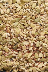 Cereal Mix of flax seeds, sesame, sunflower and pumpkin seeds close up