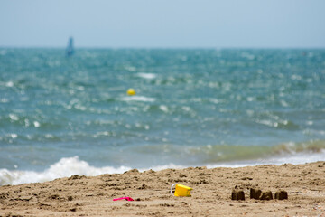 Shovel and bucket on the beach