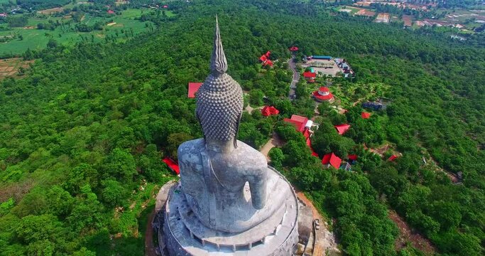 aerial view Big Buddha in the Temple Wat Phu Manorom in Mukdahan Thailand .Isan thailand statue buddha hi-res stock photography and images Stock Video Footage - 4K .and HD Video Clips .