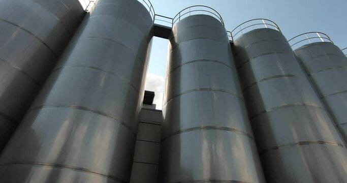 A milk storage tank at a dairy plant. Milk tanks in the unloading area