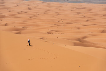 Hiking up the Great Dune of Merzouga in the Erg Chebbi desert