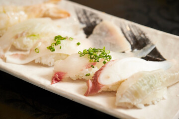 Different types of sushi on a plate