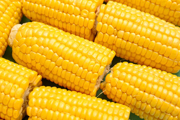 Texture of fresh corn cobs as background