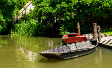 traditional boat on the river and forest- Marais Poitevin in France