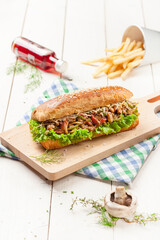 A chicken sandwich is a sandwich that typically consists of boneless, skinless chicken breast or thigh served between slices of bread, on a bun, or on a roll. Variations on the "chicken sandwich" 