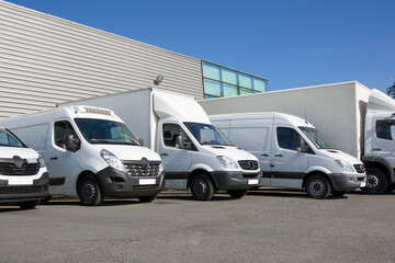 van transportation fleet of cargo trucks courier service truck park