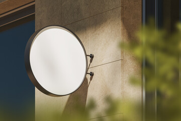 Circular sign board mockup on beige concrete wall outside, empty display