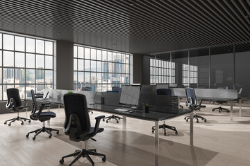 Dark business room interior with workspace and meeting room, panoramic window