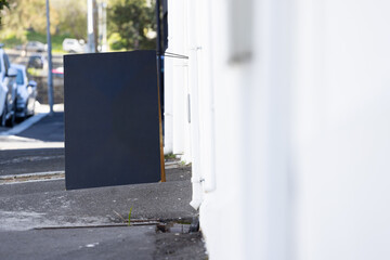 Blank sign standing on pavement with copy space