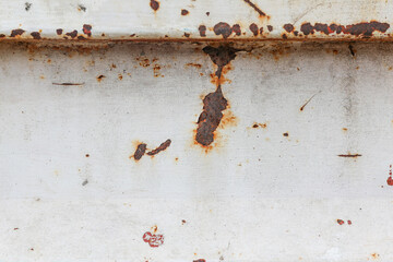 Old metal plate with rust and cracks for background images and textures