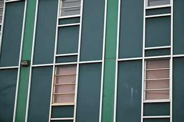 Architecturally modern building with a bright green exterior