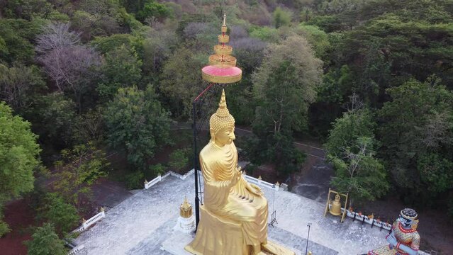 Drone view over the Buddha in Khao Kradong Forest Park