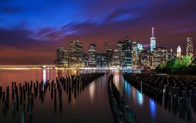 Manhattan skyline after sunset seen from Brooklyn.