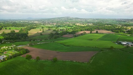 Fototapeta na wymiar Aerial view of a beautiful green valley with lush vegetation.