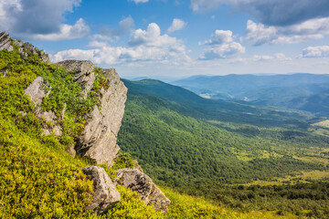 Beautiful view on the Ukrainian Polonynian Beskids to the mountains and valleys. Rocky peaks of the Ukrainian Carpathians in summer. Water-making ridge in the Carpathians, Carpathian mountains