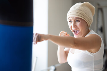 Strength in Adversity, Fit and strong fitness Caucasian Woman Living a Healthy Life After Cancer....