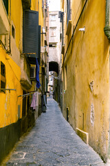 Fototapeta na wymiar Narrow city street in the historical center of Naples.