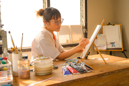 Artist drawing in studio