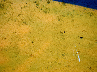 yellow texture of decorative plaster close-up