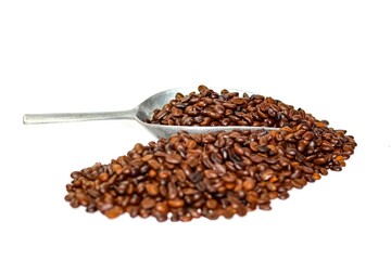Coffee beans spread over the surface on white background in concept isolated picture style.