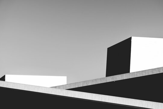 Urban landscape featuring modern buildings creating a geometric pattern.