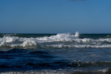 Picturesque view of crashing waves at Thy National Park in Denmark.