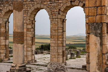 Iconic ruins of the forum in Volubilis, an old ancient Roman city in Morocco