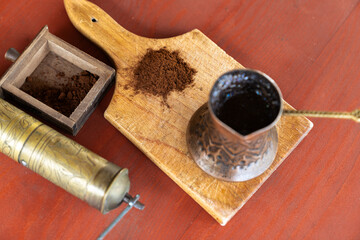 Vintage coffee pot and manual coffee grinder. Retro style of making natural espresso