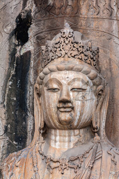Buddha portrait in Longmen Grottoes. China. The grottoes were built over the period from 493 AD to 1127 AD