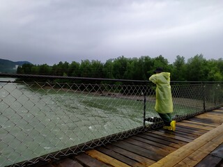 person walking on bridge