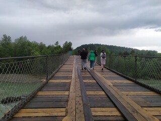wooden bridge over the river
