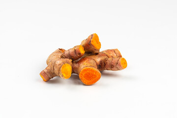 Turmeric (Curcuma longa Linn) rhizome (root) isolated on white background with clipping path.