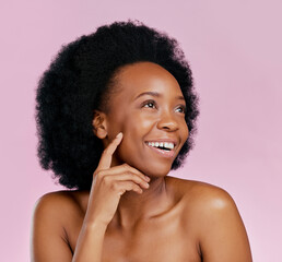 Thinking, skincare or happy black woman with glow from dermatology, salon cosmetics or wellness. Smile, ideas or face of African model with beauty or self love isolated on a pink background in studio