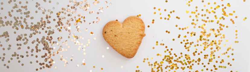 Banner with cookies in the form of a heart on a white background