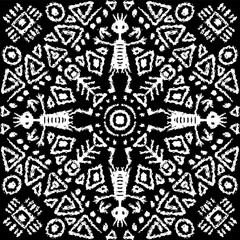 African ethnic tribal seamless pattern background on black and white.