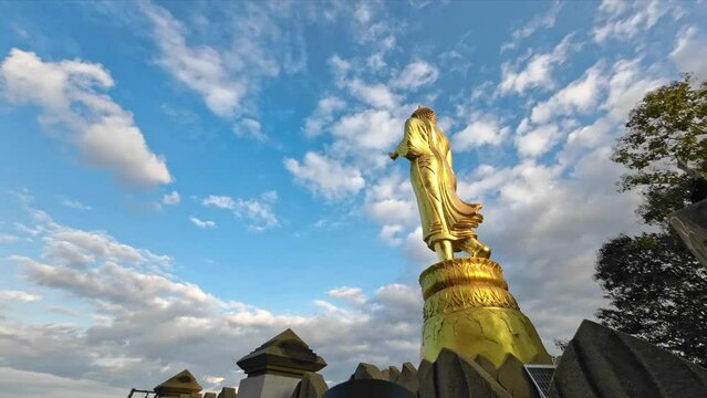 Tranquil Thailand. Clouds, Landmarks, and Buddha Statues in Time Lapse. Wat Phumin, Nan, Thailand
