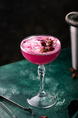 Summer pink cocktail with rose flowers