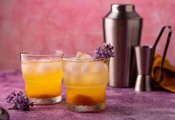 Summer cocktail with mango juice and ice