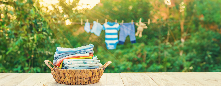 washing baby clothes. Linen dries in the fresh air. Selective focus.