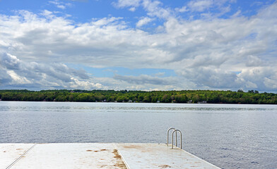 Pier on 3691-acre Messalonskee Lake, located in Kennebec and Moose River Valleys Region, Maine, United States