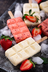 Strawberry ice cream pop sicle with mint