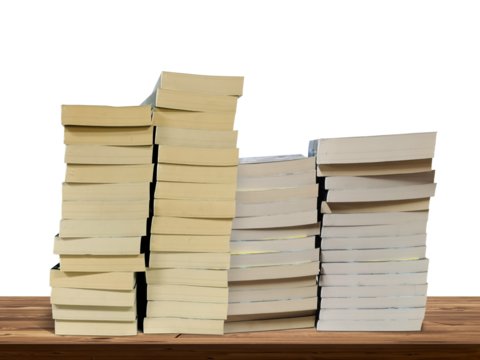 Stack of books lies on wooden table isolated PNG transparent