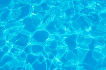 water in swimming pool rippled water detail background
